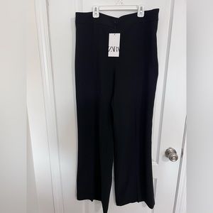 NWT. Zara high waisted black wide leg dress pant with side zipper.